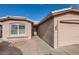 View of the house's walkway leading to the front door and garage at 1486 E Augusta Ave, Chandler, AZ 85249