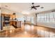 Open concept kitchen with wood cabinets, stainless steel appliances, and an island at 1486 E Augusta Ave, Chandler, AZ 85249