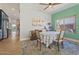 Dining room with kitchen views and seating for four at 1618 E Montoya Ln, Phoenix, AZ 85024