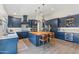 Renovated kitchen, featuring blue cabinetry, an island, and stainless steel appliances at 1618 E Montoya Ln, Phoenix, AZ 85024