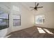 Bright and airy bedroom with bay window and ceiling fan at 1636 E Juanita Ave, Mesa, AZ 85204