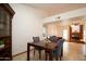 Bright dining area adjacent to the living room and kitchen at 1636 E Juanita Ave, Mesa, AZ 85204