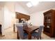 Charming dining area with a wooden table and built-in hutch at 1636 E Juanita Ave, Mesa, AZ 85204