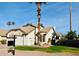 Inviting single-Gathering home with well-manicured front yard and mature palm trees at 1636 E Juanita Ave, Mesa, AZ 85204