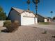 View of the garage and a portion of the community at 1636 E Juanita Ave, Mesa, AZ 85204