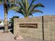 Woodbridge Crossing community sign set in a brick wall at 1636 E Juanita Ave, Mesa, AZ 85204