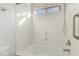 Clean bathroom with a bathtub and shower at 17840 W Calavar Rd, Surprise, AZ 85388