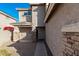 Front entrance with stone accents and walkway at 17840 W Calavar Rd, Surprise, AZ 85388