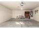 Attached garage with ample storage shelving and overhead storage at 17840 W Calavar Rd, Surprise, AZ 85388