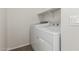 Functional laundry room with washer and dryer included at 17840 W Calavar Rd, Surprise, AZ 85388