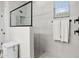 Modern bathroom with a walk-in shower and stylish tile at 17855 W Thistle Landing Dr, Goodyear, AZ 85338