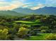 Scenic golf course view with mountain backdrop at 17855 W Thistle Landing Dr, Goodyear, AZ 85338