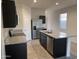 Modern kitchen with stainless steel appliances and granite countertops at 18227 N Conquistador Dr, Maricopa, AZ 85138