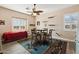 Small dining area with table, chairs, and southwestern rug at 216 W Paoli St, San Tan Valley, AZ 85143