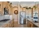 Modern kitchen with stainless steel appliances and ample cabinet space at 216 W Paoli St, San Tan Valley, AZ 85143