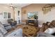 Relaxing living room with southwestern decor and a view to the backyard at 216 W Paoli St, San Tan Valley, AZ 85143