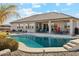 Relaxing pool area, expansive patio, and outdoor seating at 216 W Paoli St, San Tan Valley, AZ 85143