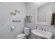 Small bathroom with white pedestal sink and toilet at 21809 N 39Th St, Phoenix, AZ 85050