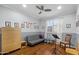 Cozy bedroom with wood floors and a sleeper sofa at 21809 N 39Th St, Phoenix, AZ 85050