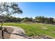 Community park with walking path and grassy area at 21809 N 39Th St, Phoenix, AZ 85050