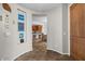 Entryway with wood door and view of kitchen at 21809 N 39Th St, Phoenix, AZ 85050