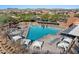 Resort-style pool with ample lounge chairs and shade structures at 21809 N 39Th St, Phoenix, AZ 85050