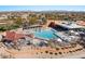 Community pool with large sundeck and shaded areas at 21809 N 39Th St, Phoenix, AZ 85050