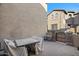 Small patio with table, chairs, and a gate at 21809 N 39Th St, Phoenix, AZ 85050