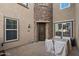 Private patio with table and chairs, near the entrance at 21809 N 39Th St, Phoenix, AZ 85050