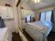 Main bedroom with mirrored closet doors and a ceiling fan at 2273 S Seminole Dr, Apache Junction, AZ 85119