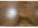 Dark brown wood-look laminate flooring throughout at 2273 S Seminole Dr, Apache Junction, AZ 85119