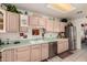 Kitchen featuring stainless steel appliances and light-colored cabinetry at 2329 N Recker Rd # 94, Mesa, AZ 85215