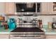 Stainless steel stove and microwave combo in a well-lit kitchen at 2329 N Recker Rd # 94, Mesa, AZ 85215