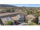 House nestled in a residential neighborhood with mountain views at 2405 E Beverly Rd, Phoenix, AZ 85042