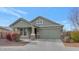 Single-story house with attached garage and landscaping at 2405 E Beverly Rd, Phoenix, AZ 85042