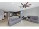 Spacious living room with gray couches and kitchen views at 2405 E Beverly Rd, Phoenix, AZ 85042