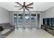 Living room with sliding glass doors leading to backyard at 2405 E Beverly Rd, Phoenix, AZ 85042