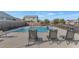 Community pool with lounge chairs at 2405 E Beverly Rd, Phoenix, AZ 85042