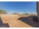 Large, unlandscaped backyard with block wall and AC unit at 244 W Wier Ave, Phoenix, AZ 85041