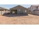 Backyard view of house and block wall at 244 W Wier Ave, Phoenix, AZ 85041