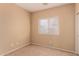 Simple bedroom with window and carpet at 244 W Wier Ave, Phoenix, AZ 85041