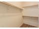 Walk-in closet with double hanging rods at 244 W Wier Ave, Phoenix, AZ 85041