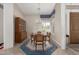 Formal dining room with a chandelier and built-in hutch at 24826 S Stoney Lake Dr, Sun Lakes, AZ 85248