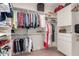 Spacious walk-in closet with ample hanging and shelving space at 24826 S Stoney Lake Dr, Sun Lakes, AZ 85248