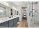 Elegant bathroom featuring double vanity and large shower at 26123 N 20Th Dr, Phoenix, AZ 85085