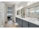 Bright bathroom with double sinks and marble accents at 26123 N 20Th Dr, Phoenix, AZ 85085