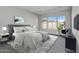 Main bedroom with carpet and large windows at 26123 N 20Th Dr, Phoenix, AZ 85085