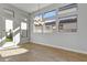 Breakfast nook with abundant natural light and chandelier at 26123 N 20Th Dr, Phoenix, AZ 85085