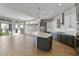 Modern kitchen with large island and gray cabinets at 26123 N 20Th Dr, Phoenix, AZ 85085