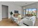 Living room with sliding glass doors and backyard access at 26123 N 20Th Dr, Phoenix, AZ 85085